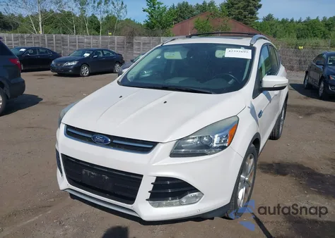 2014 Ford Escape Titanium z USA, uszkodzony, nr VIN 1FMCU9J94EUA01800